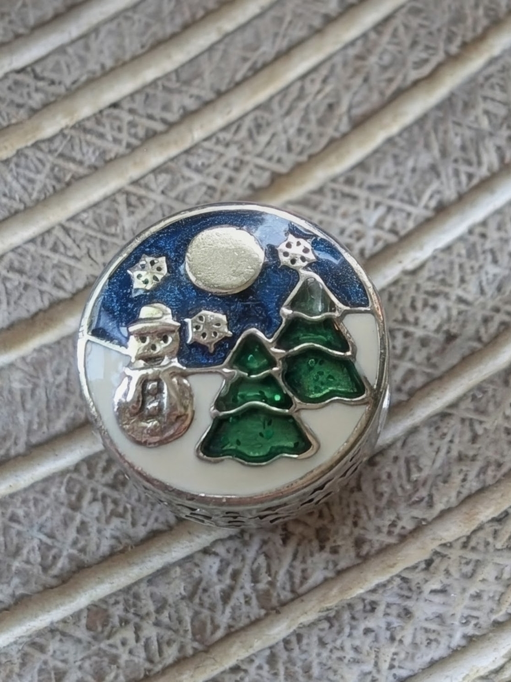Pandora Snowy Wonderland charm, featuring a snowman and Christmas Trees